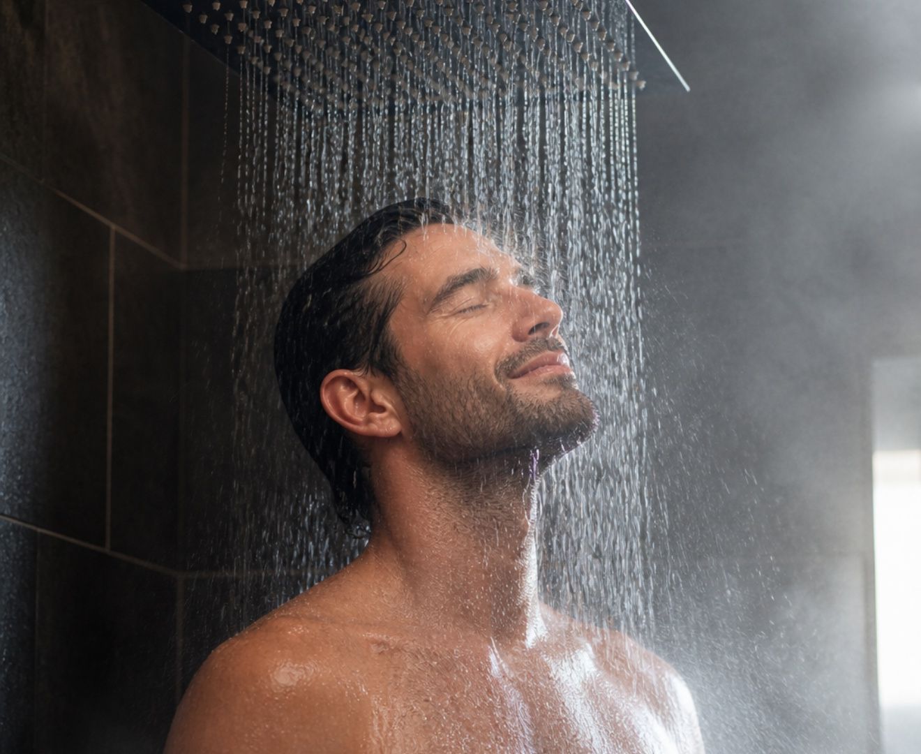 Man enjoying a high-pressure hot shower